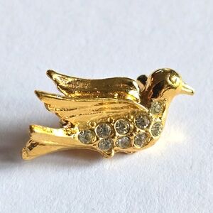 Vintage bird pin small brooch gold tone clear rhinestones fly flying wing animal